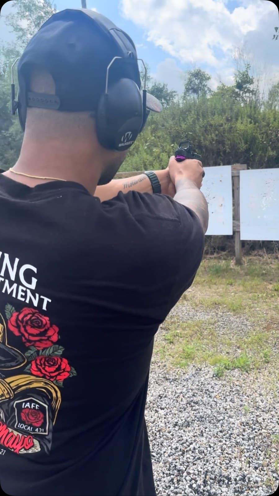 Marlo coaching a student on the firing line during a Back 2 Basics CPL class