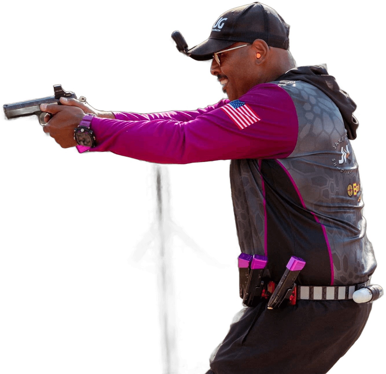 Marlo Odus of Back 2 Basics CPL shooting on the move at a USPSA match